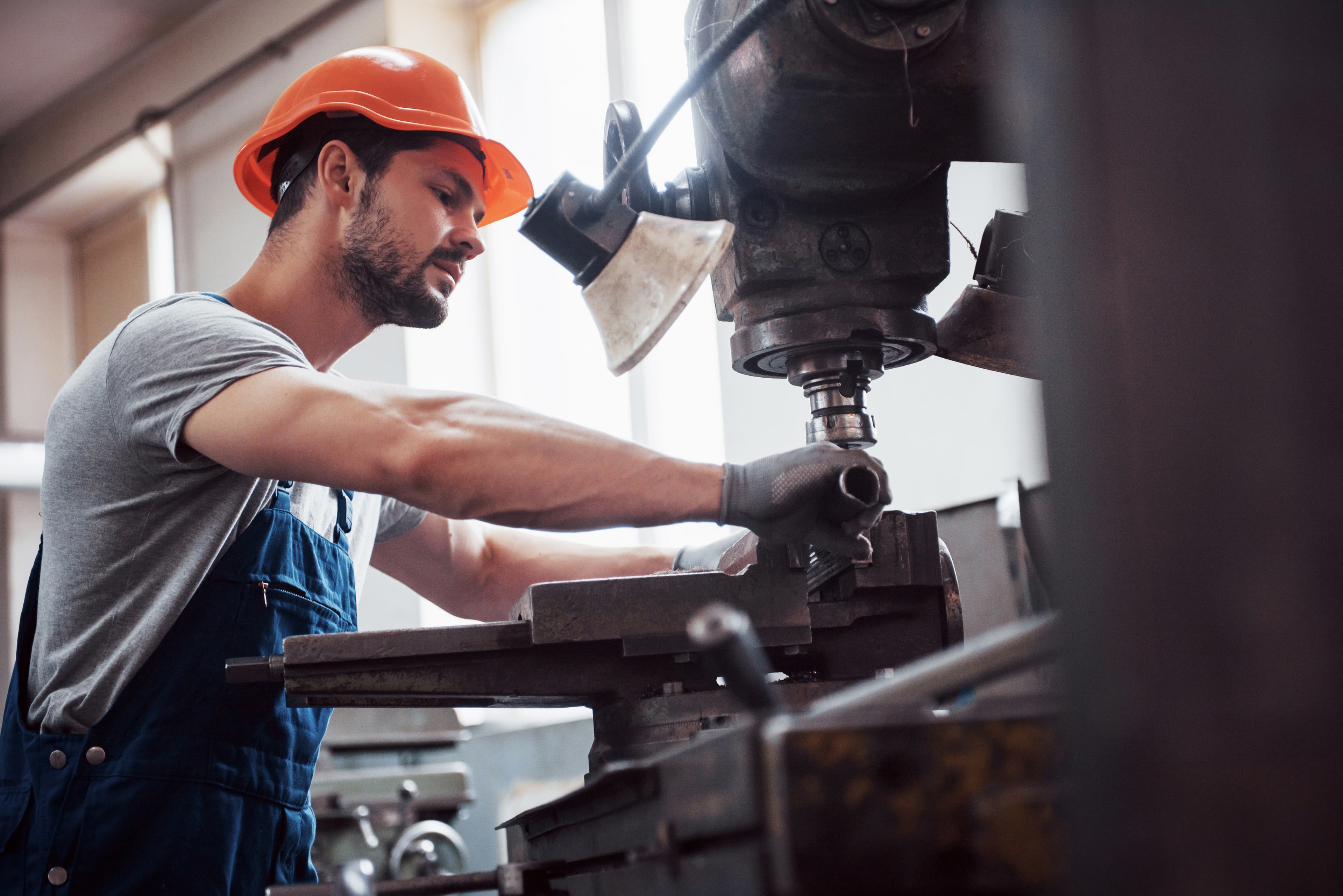 Craftsman operating production machinery